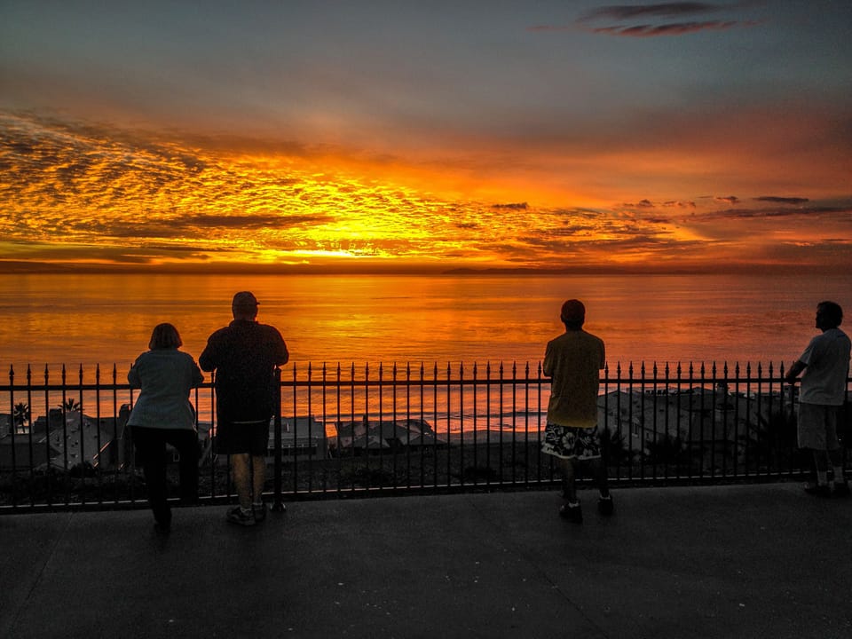 Spectacular sunset at Strands Beach drew a crowd on Jan 7, 2014.
