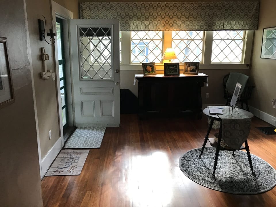 Front Entrance Foyer leads to Kitchen and Living areas