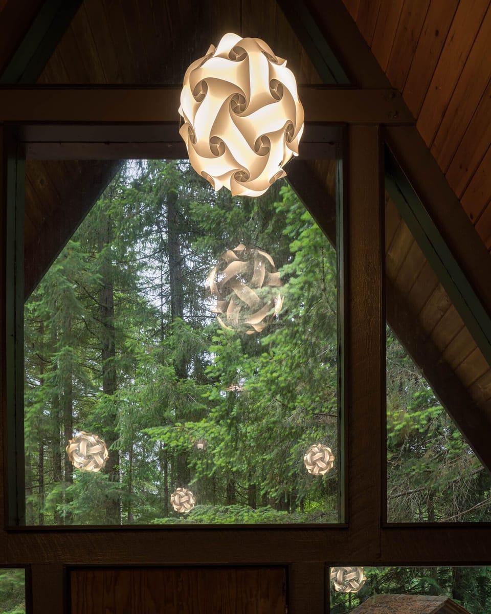 living room lights reflecting in front window