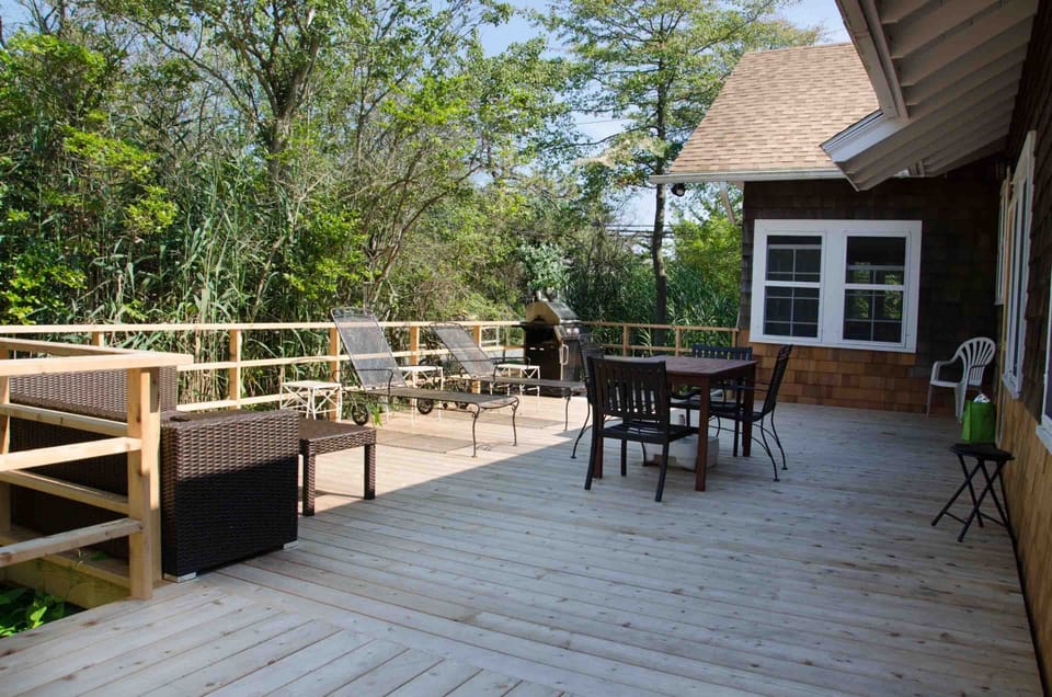 Deck with furniture.