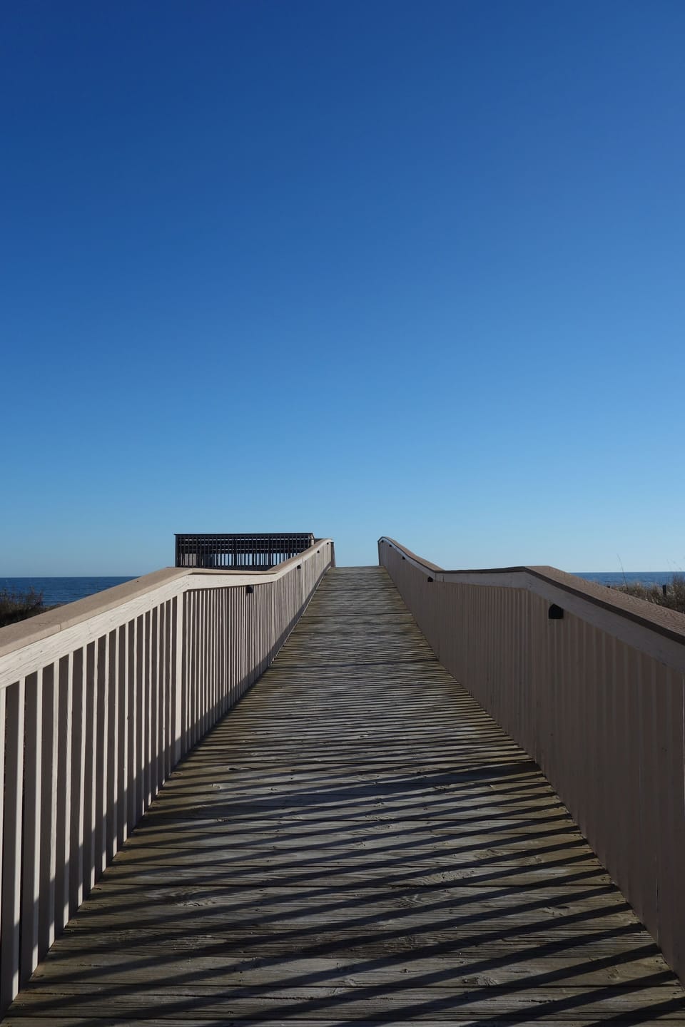 Walkway from condo complex to ocean.  