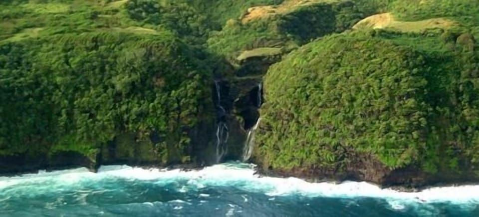 Take a helicopter tour of the island and see waterfalls and whales!