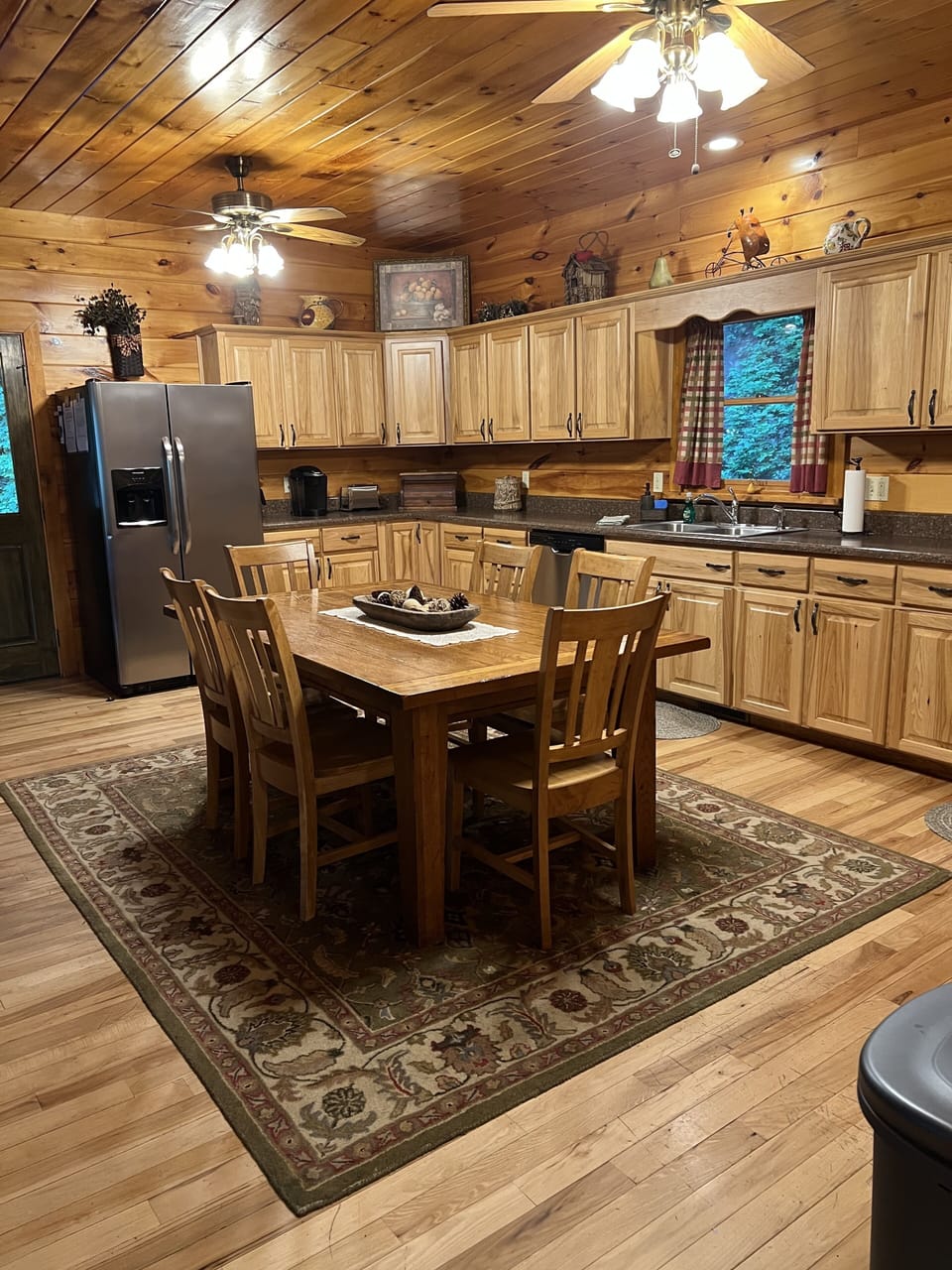 Kitchen and dining table, table has two leaves and will seat 10