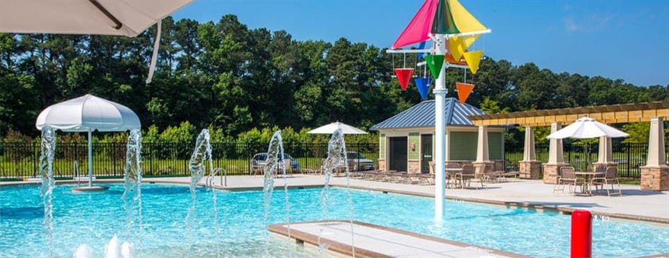 Large community pool perfect for cooling off and lounging in the sun!