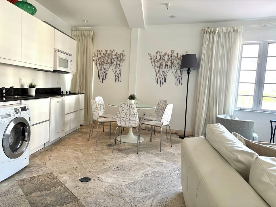 Open concept living area, dining and kitchen