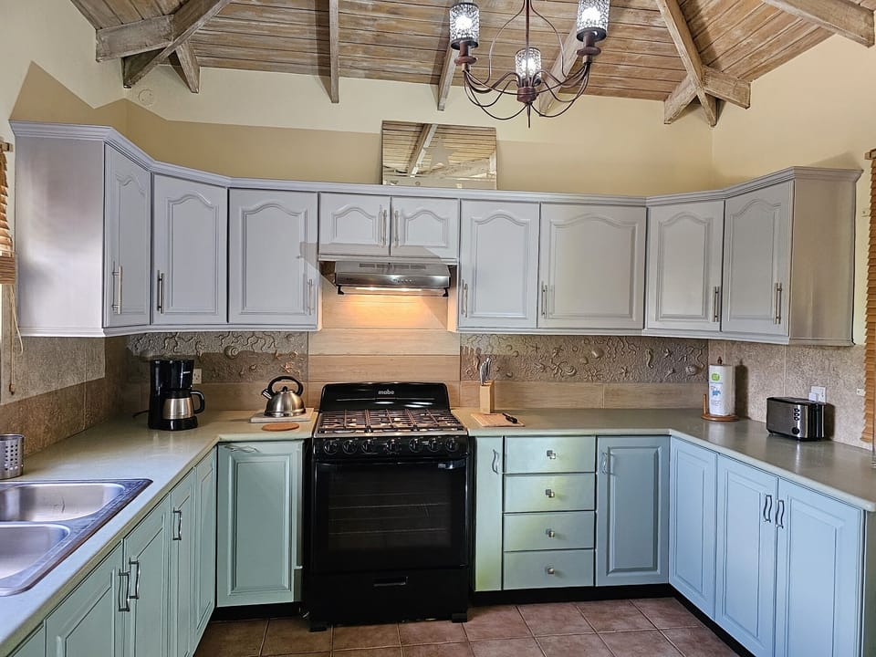 Newly renovated kitchen with brand new 6 burner stove top, oven and extractor.