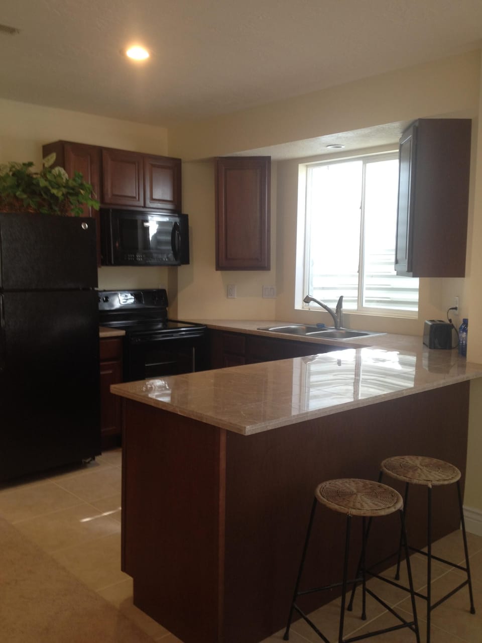 Full kitchen with most appliances