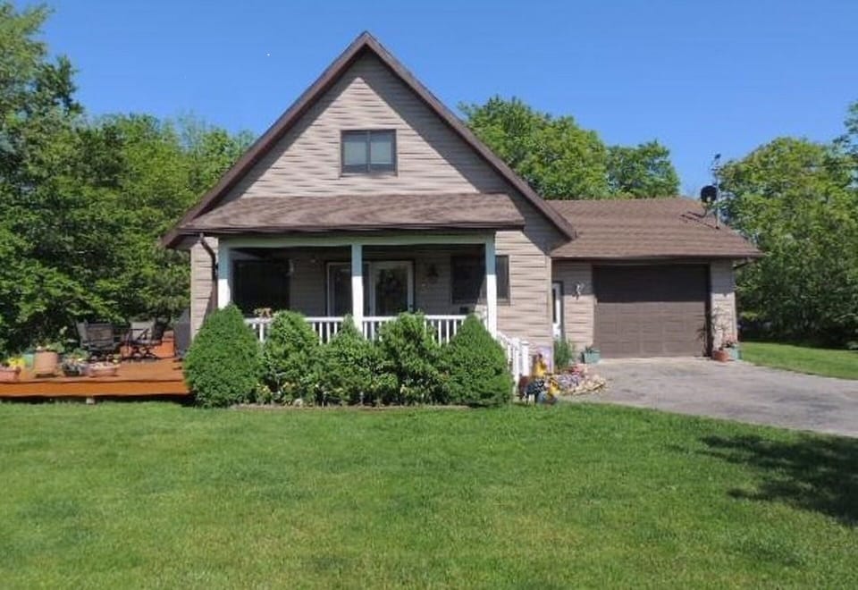 FRONT VIEW WITH DECK AND GARAGE