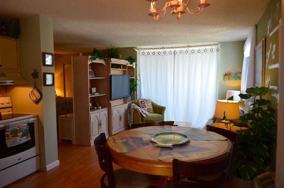 Kitchen table expands to seat 6 people.
