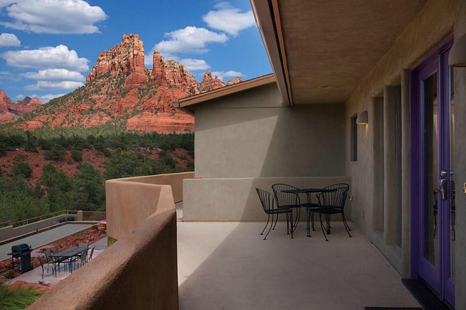 Sunset Suite #4 balcony with views of downtown and Snoopy Rock.