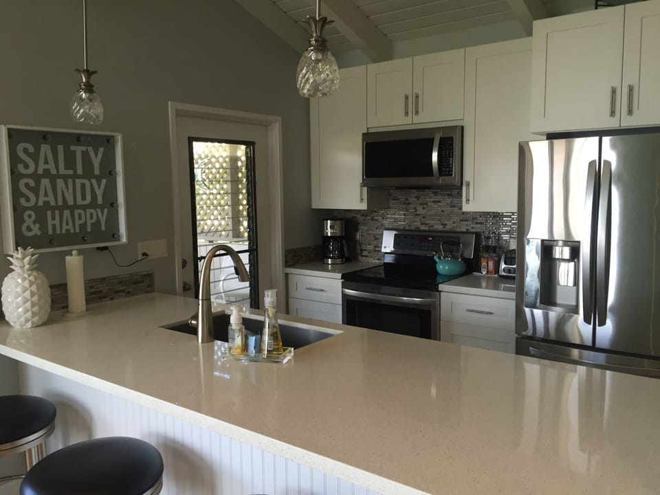 Fabulous kitchen with door to lanai.