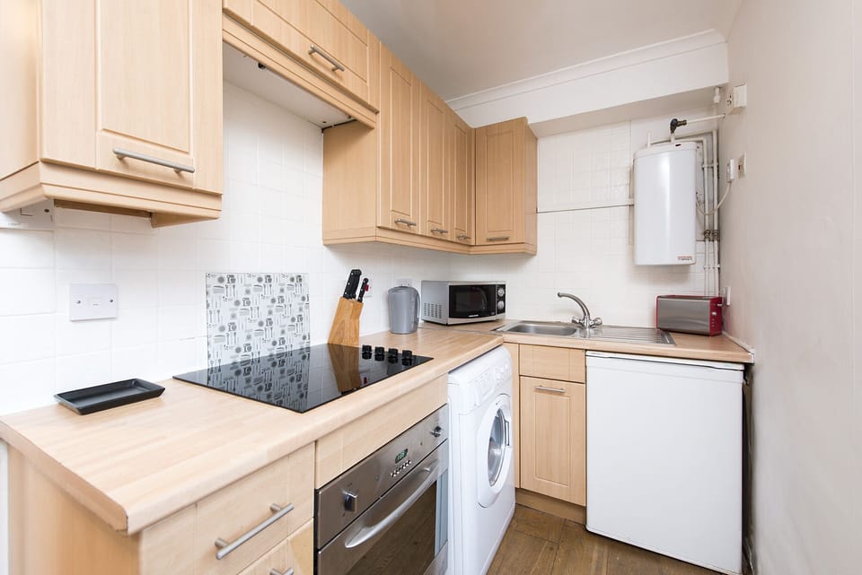 Combination washer dryer and fridge