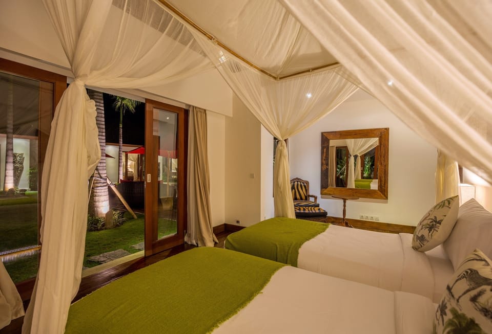 Twin bedrooms as another guest bedrooms that can also be combined into one bed