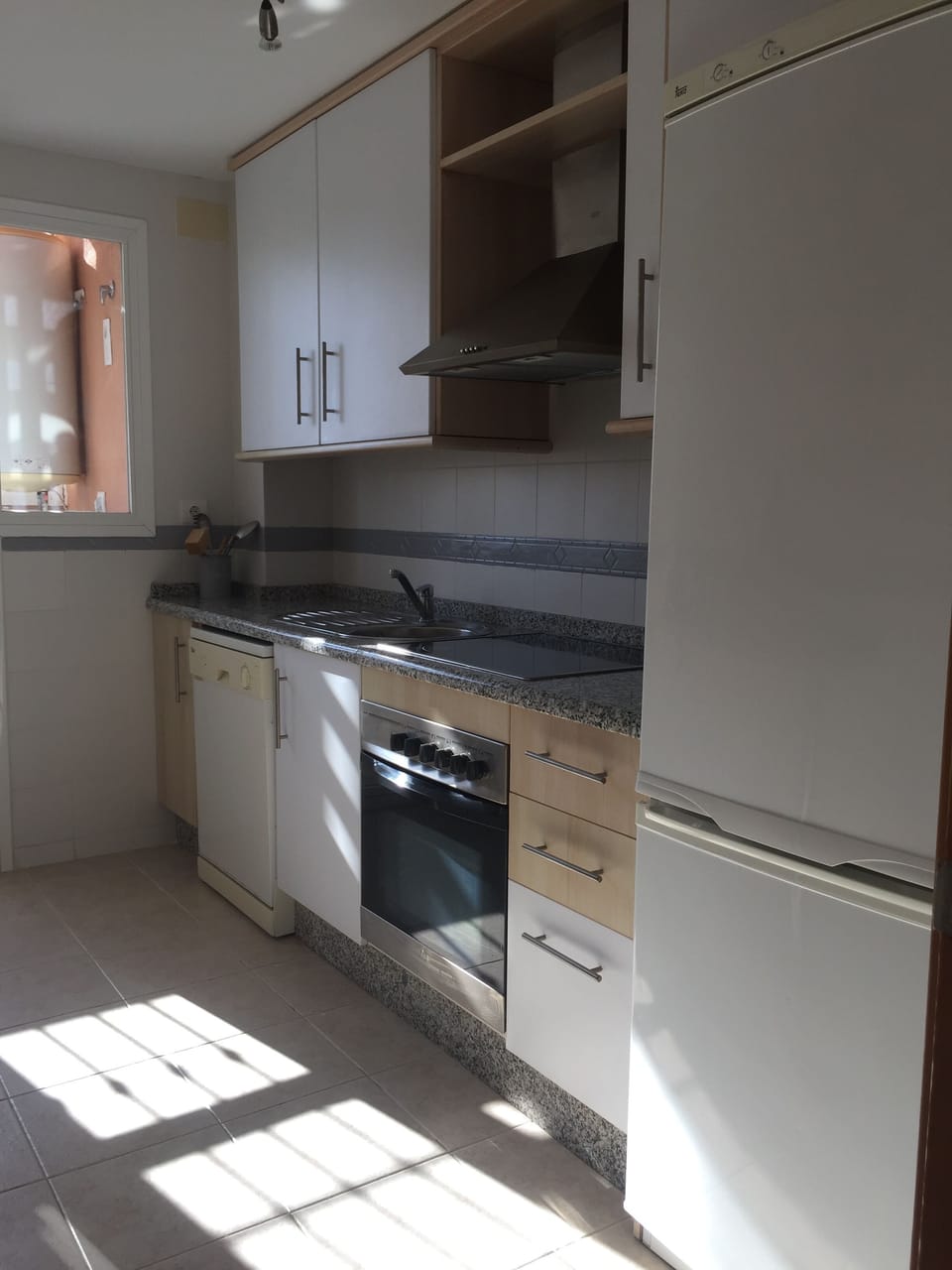 Kitchen, has fridge freezer, microwave,  toaster, dishwasher and washing machine