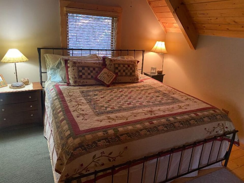 Upstairs king bed in loft