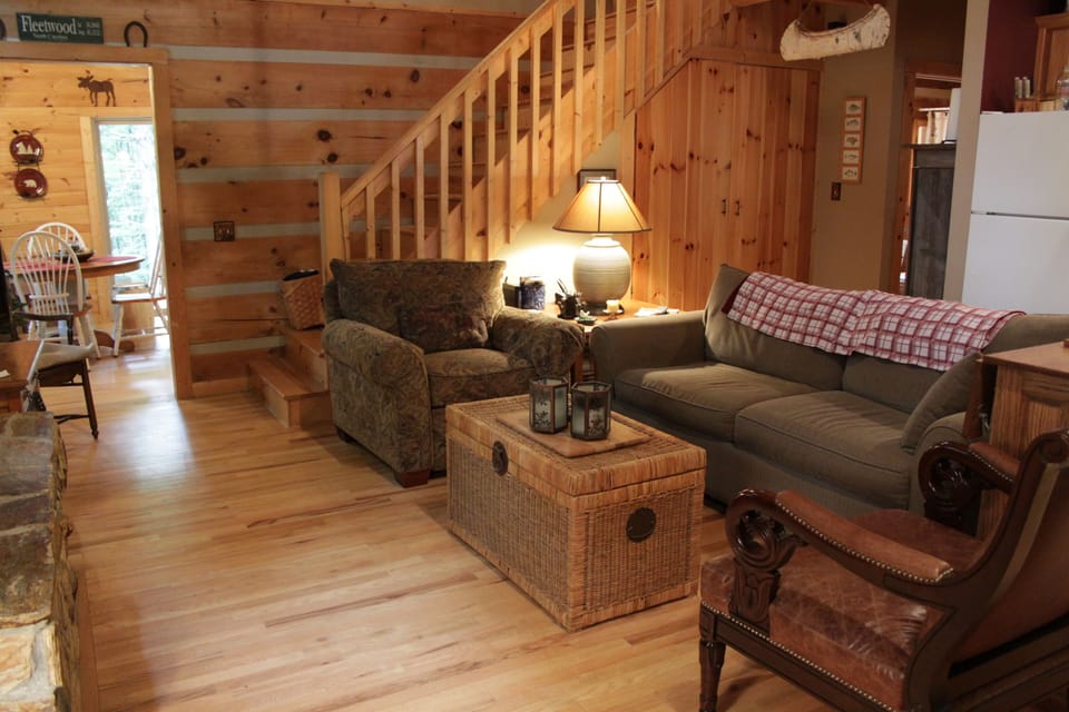 Living area looking towards sunroom and dining area.