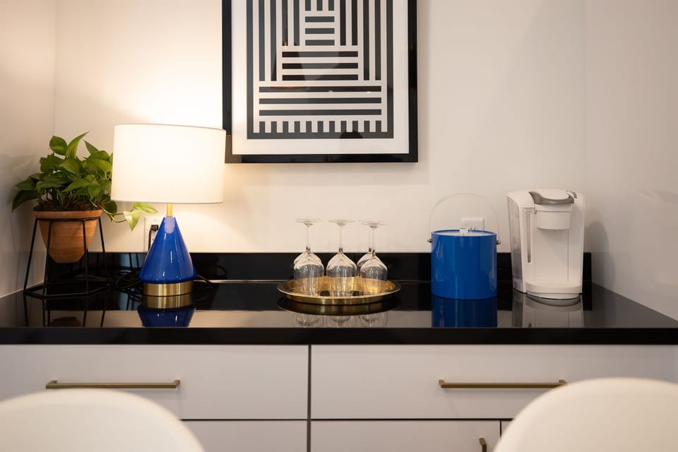 Kitchen storage and coffee maker.