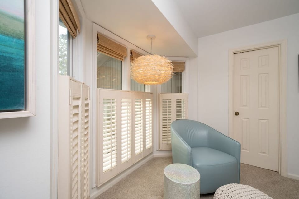 Master bedroom: king bed, sitting area and ensuite full bathroom.