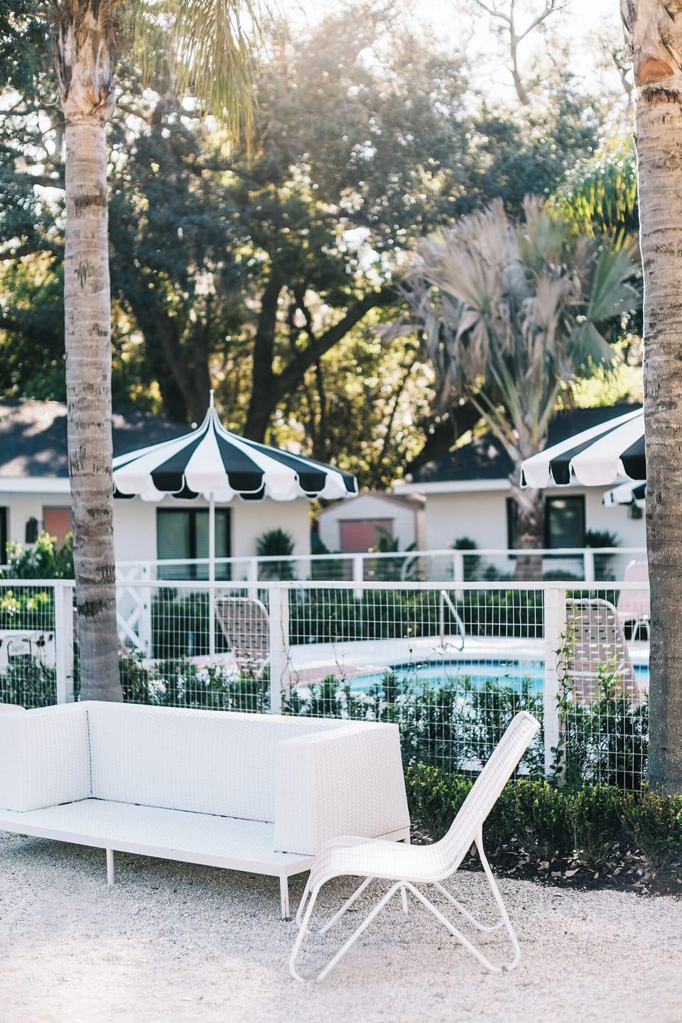 Common area seating outside the fenced-in pool