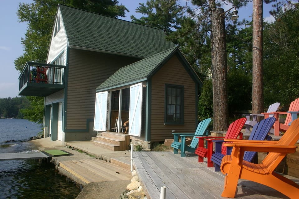Tiki Bar between the Boat House and Adirondack Chairs