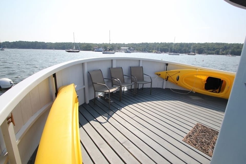 front deck out side the stateroom; 2 kayaks