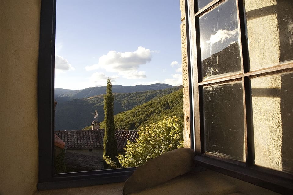 Bedroom 1: View from window on cypress and hills.