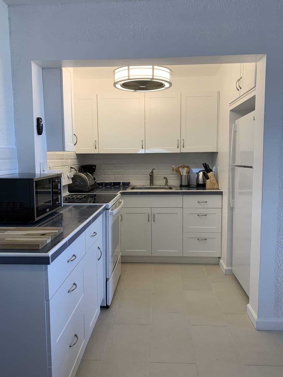 Full oven/stove, microwave, toaster oven, huge refrigerator, coffee maker, etc