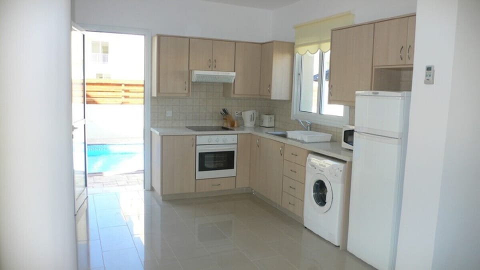 Kitchen with granite work surfaces