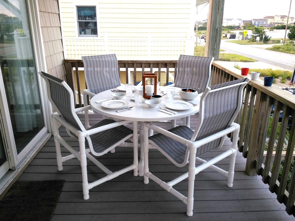Enjoy dining on our front porch or hosting happy hour!
