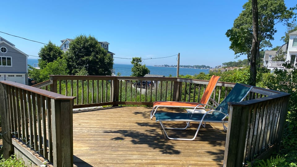 Deck leading to beach stairs.