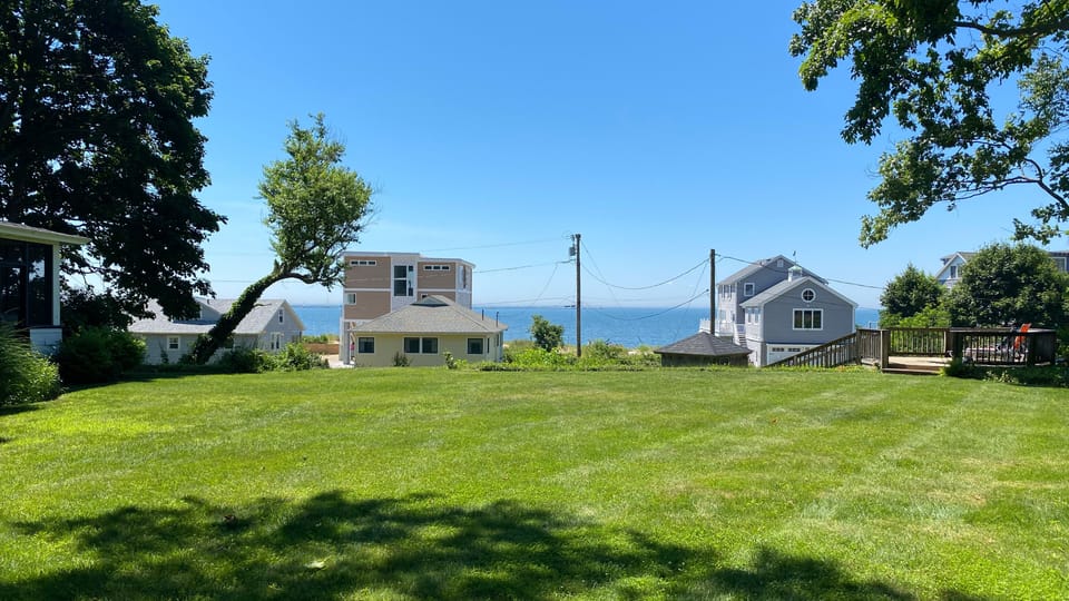 Yard overlooking beach.