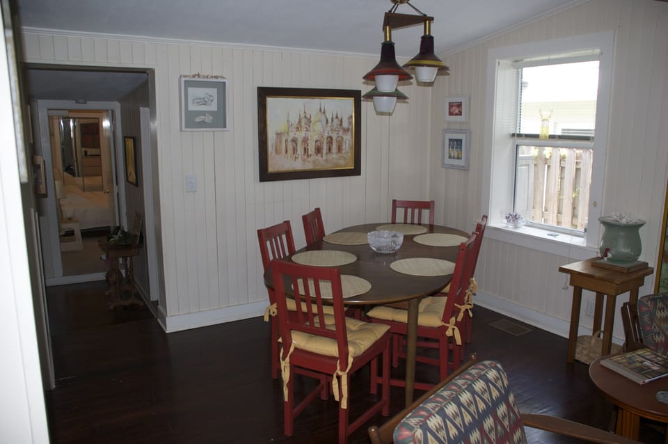 The dining room table contracts to four and expands to eight.