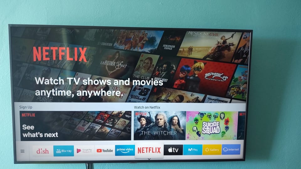 60" smart TV with Amazon Fire stick and Thunder TV for live US TV in 2 rooms