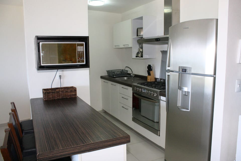 Kitchen & Microwave, look a blender, margaritas?
