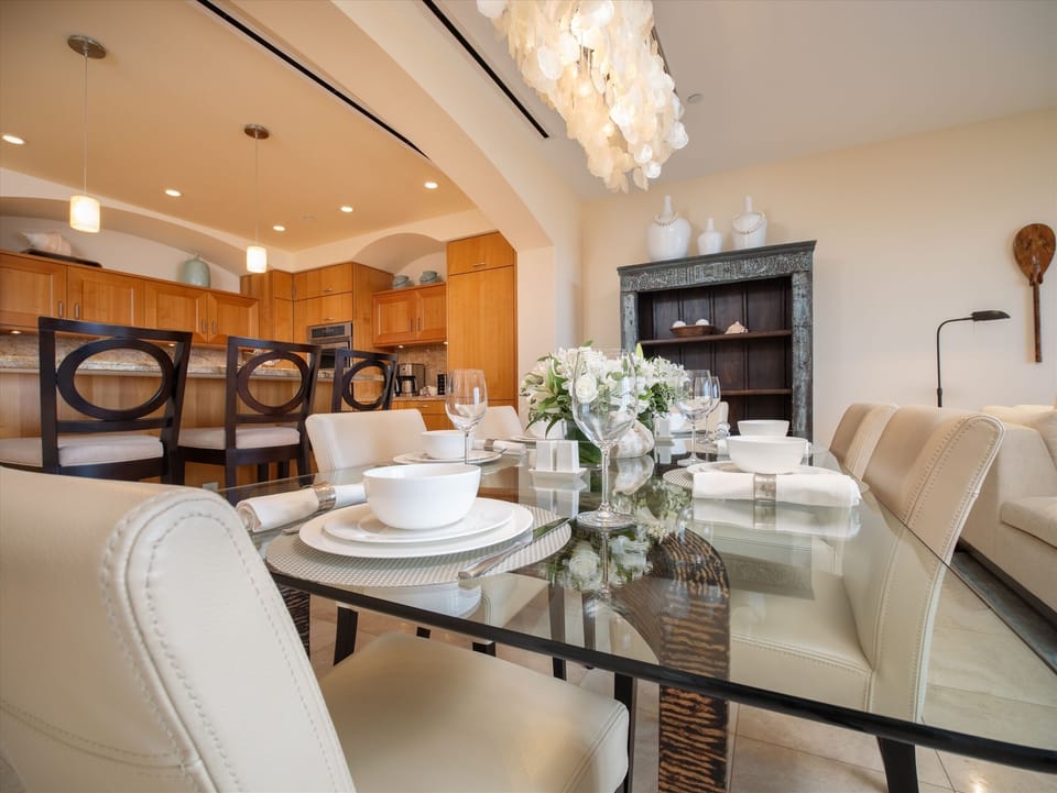 Elegant Dining Table Seats Six Guests Plus Three More at the Kitchen Bar