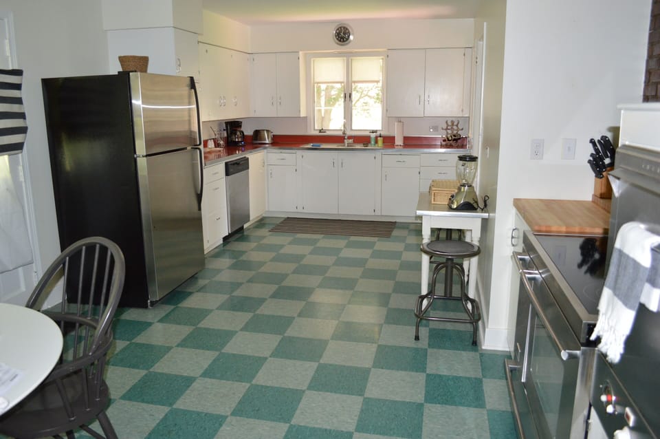 View of the other half of the kitchen; New appliances, U/C lighting.