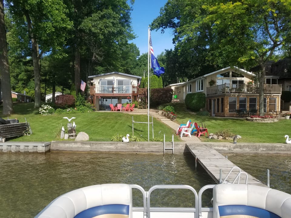 FRONT OF LAKE HOME VIEW FROM PONTOON
