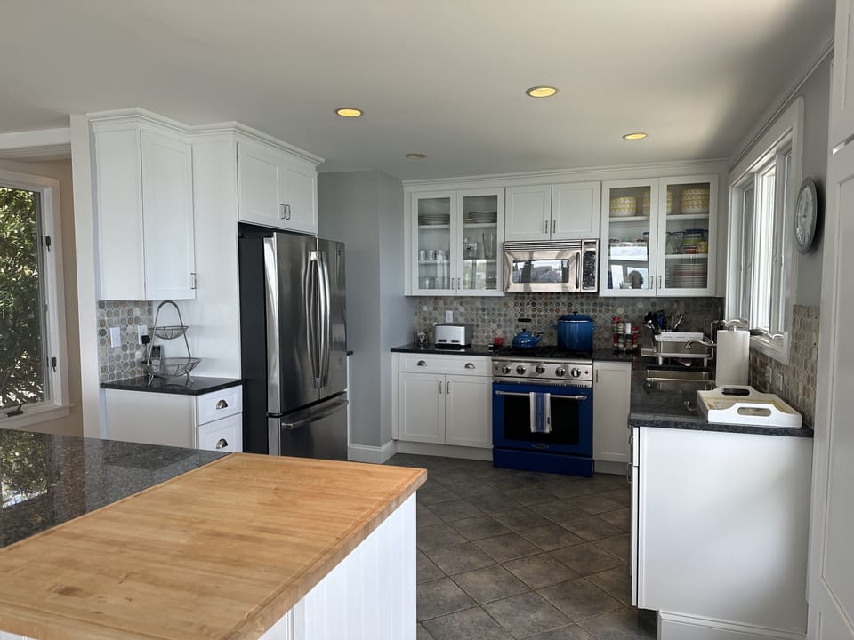 Large, fully equipped kitchen with Capital commercial range, and two dishwashers