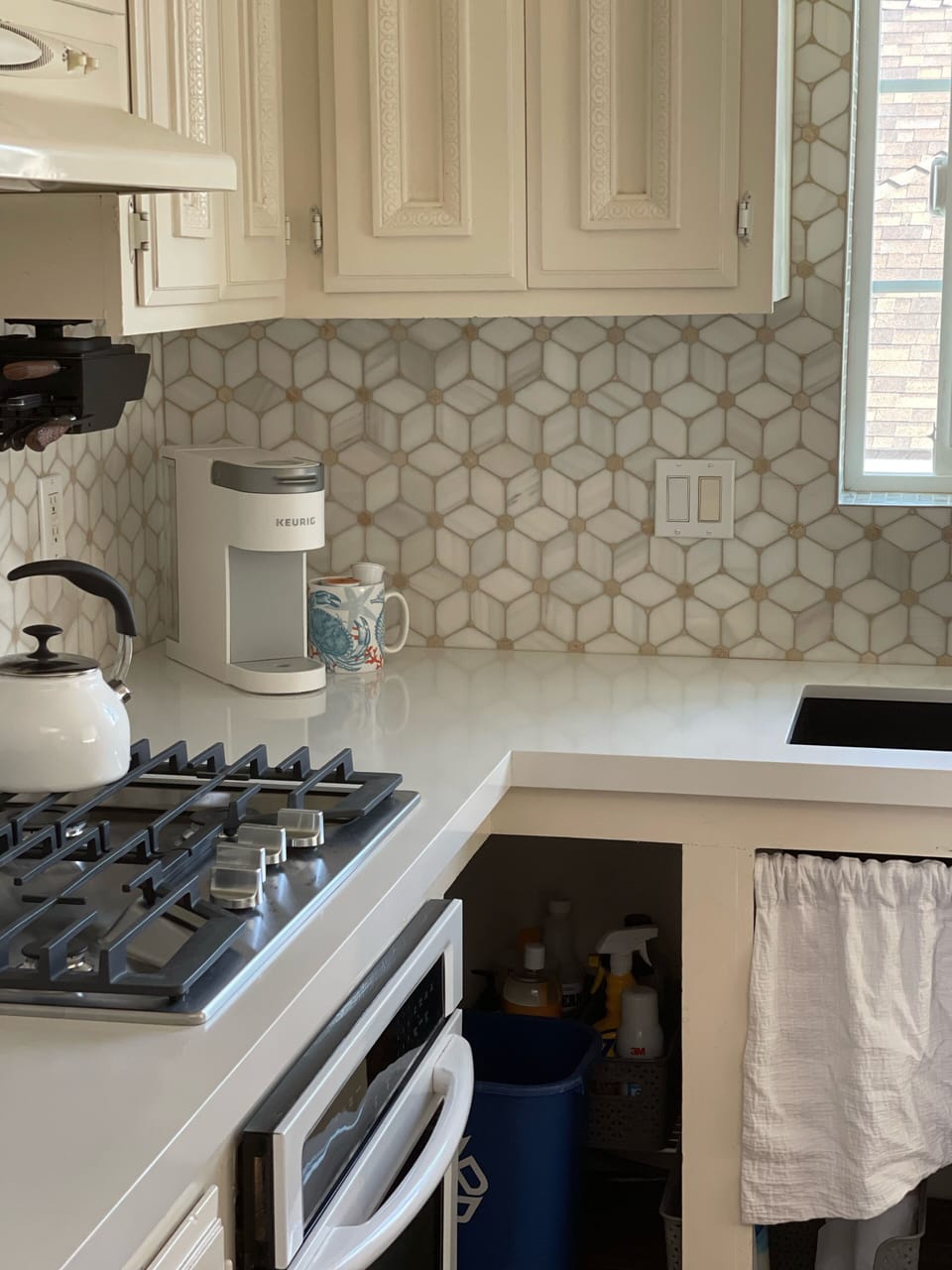 Refreshed kitchen with Pure white Quartz countertops. 