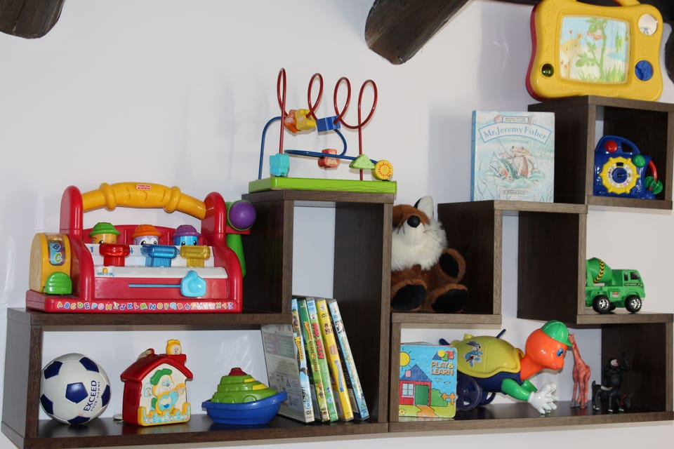 A selection of toys, videos and board games at the villa
