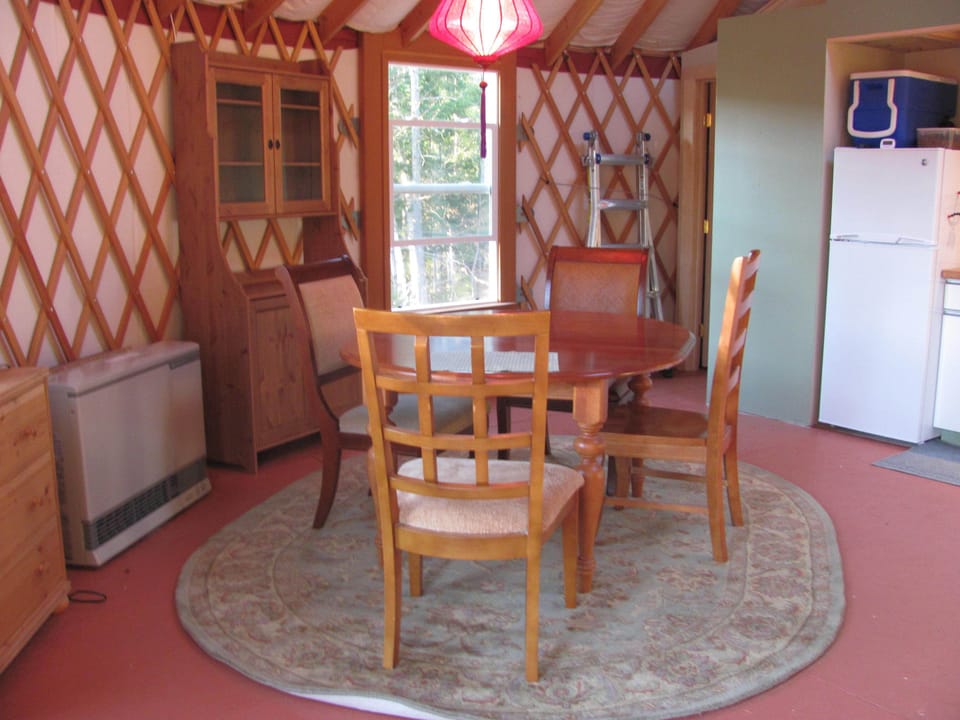 The romantic dining area seats six. The propane heater keeps the place toasty.