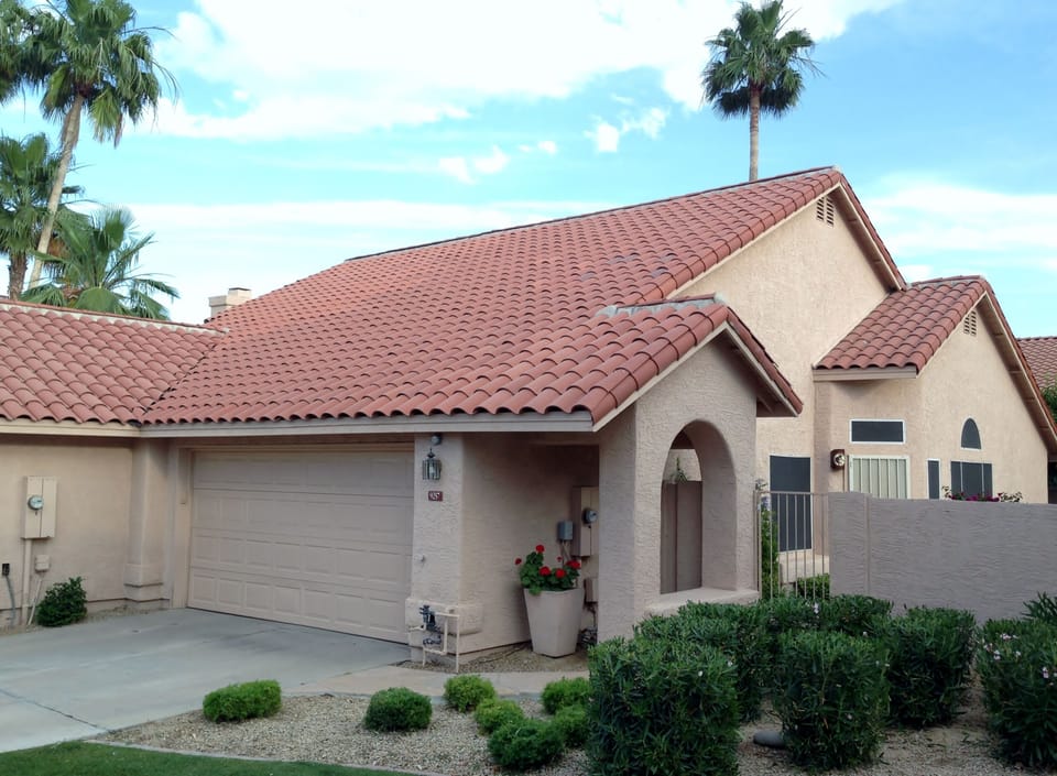 Inviting entrance to Deluxe Patio Home with 2-car garage and remote.