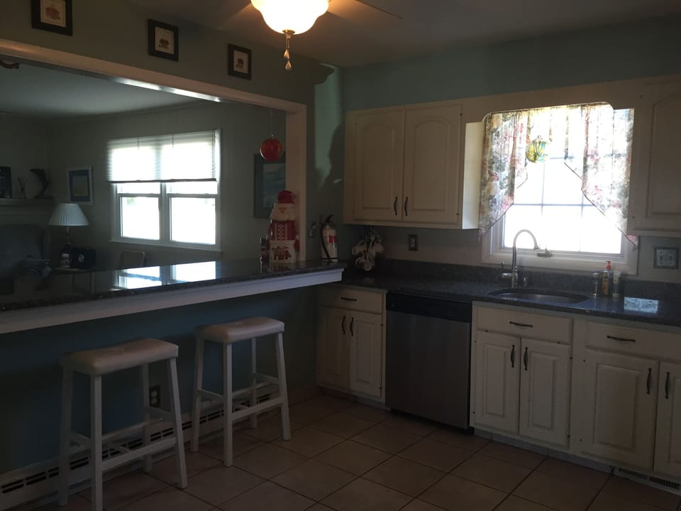Breakfast Bar looks out into the family room.