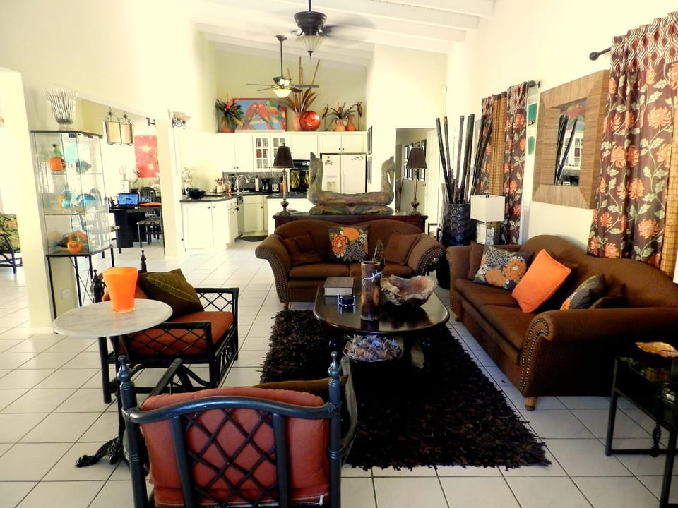 The "Great Room"- Living, Sun, Dining Rm and Kitchen Incl 4 ceiling fans + 2 A/C