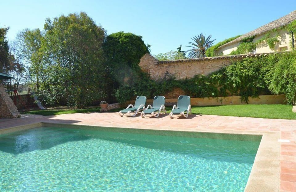 Relax by the pool and enjoy the sun or cool off in the swimming pool