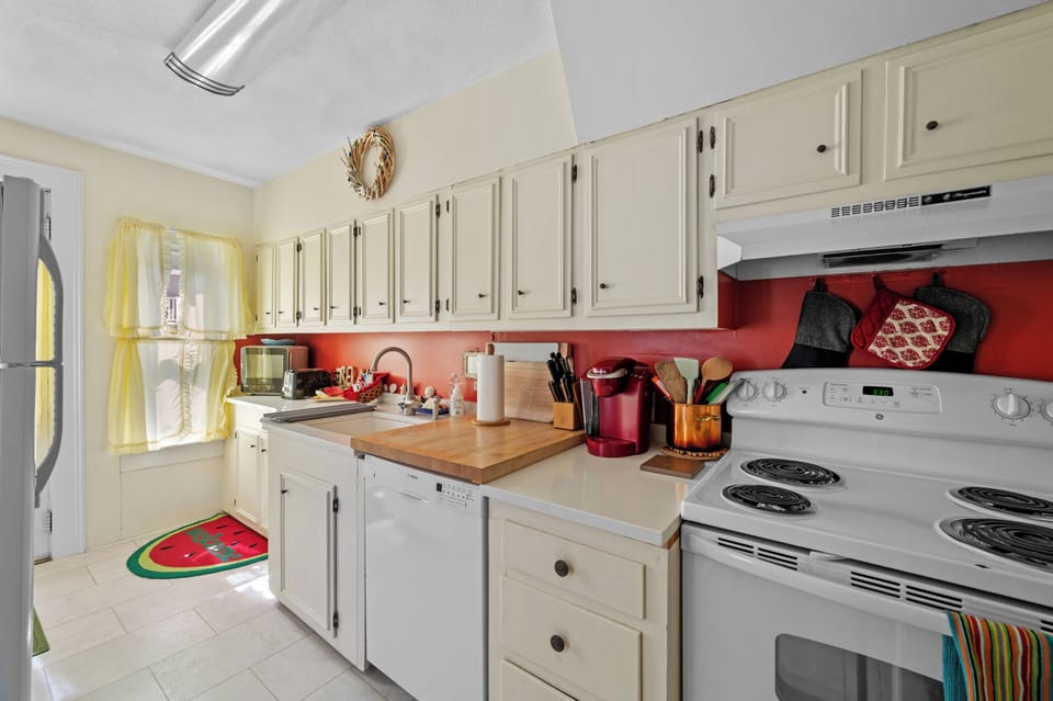 Kitchen, showing stove, dishwasher, sink, microwave