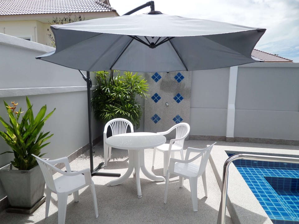 enjoy morning coffe looking over the pool