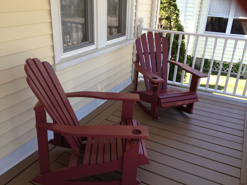Adirondack chairs on front porch are the perfect place for coffee each morning.