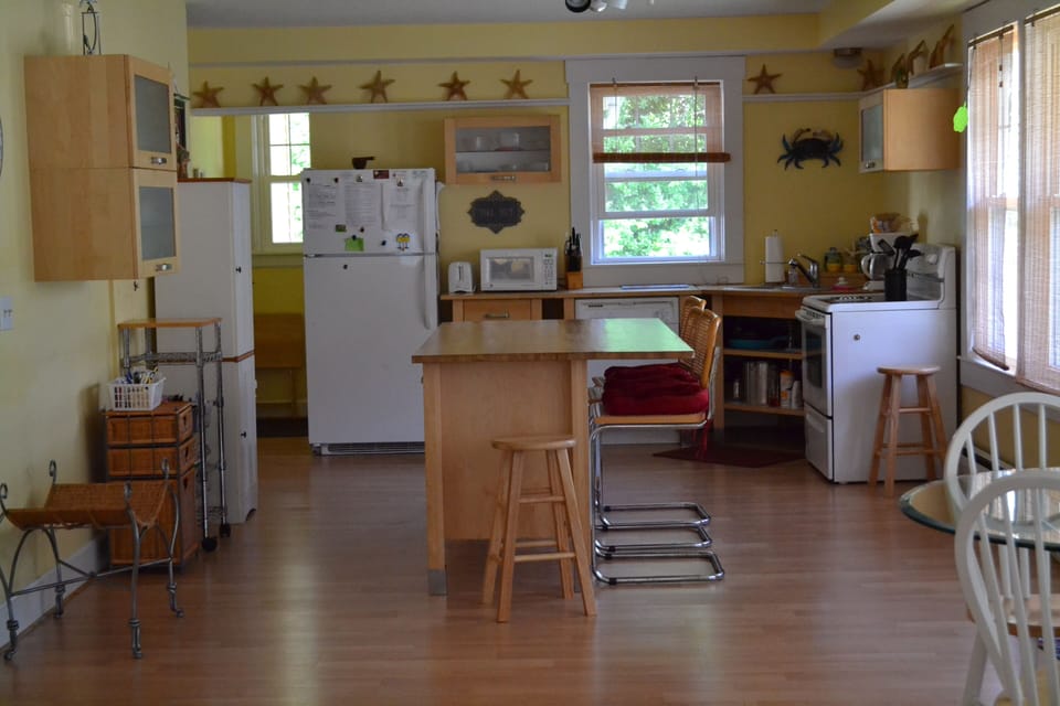 Bright and open kitchen area with center island.