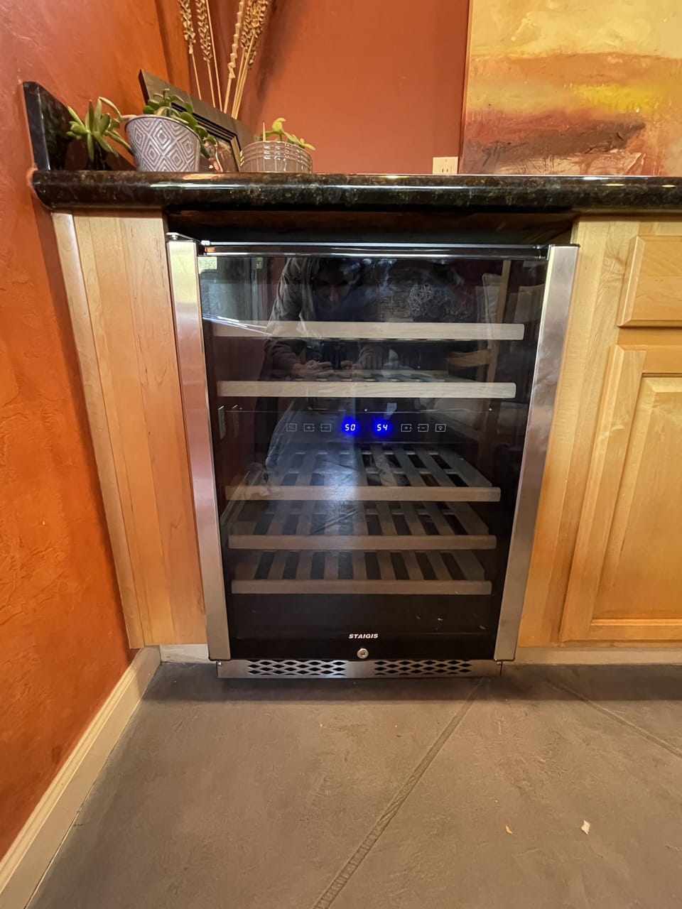 Wine fridge with plenty of storage.
